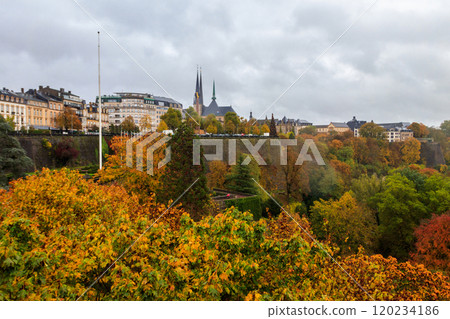 View of Luxembourg city with iconic Gelle Fra (Monument of Remembrance), Notre-Dame cathedral and multicolored autumn trees View of Luxembourg city with iconic Gelle Fra (Monument of Remembrance), Notre-Dame cathedral and multicolored autumn trees 120234186