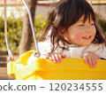 A girl playing with a swing 120234555