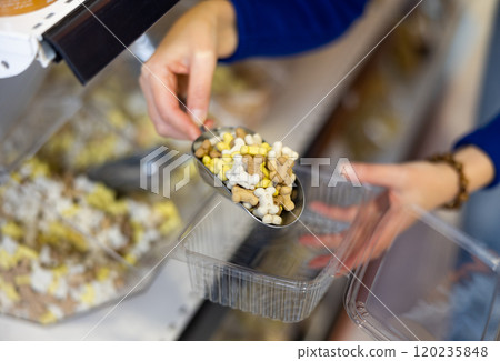 Assorted dry dog treats displayed in pet shop Assorted dry dog treats displayed in pet shop 120235848