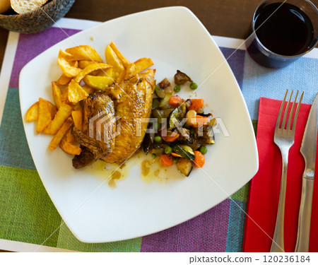 Chicken with stewed vegetables and potatoes Chicken with stewed vegetables and potatoes 120236184