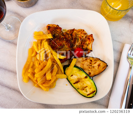 Chicken with stewed vegetables and potatoes Chicken with stewed vegetables and potatoes 120236319