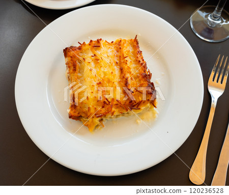 Stuffed meat cannelloni with cheese 120236528