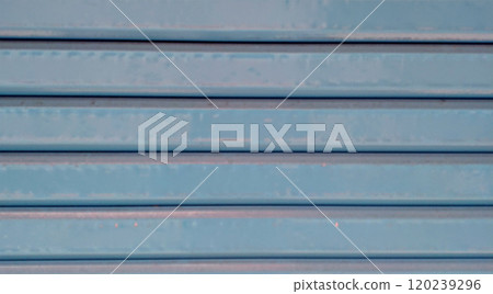 Close-up of the surface of a light blue shutter 120239296