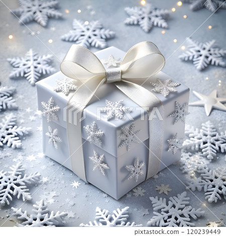 Christmas present tied with white ribbon 120239449