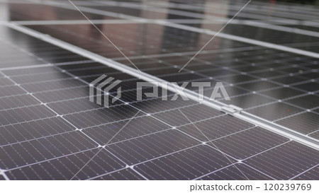 Solar panels close-up. Solar panels slow motion. Solar panels moving shot. Close-up of modern photovoltaic solar battery panels. Ecology and environment protection concept. Renewable green energy Solar panels close-up. Solar panels slow motion. Solar panels moving shot. Close-up of modern photovoltaic solar battery panels. Ecology and environment protection concept. Renewable green energy 120239769