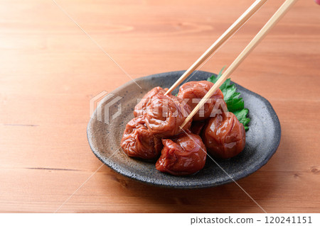 Pickled plums Kishu Nanko plums (wood grain background) 120241151