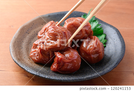 Pickled plums Kishu Nanko plums (wood grain background) 120241153