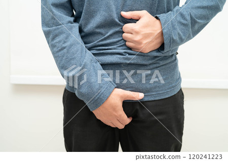 Hernia, Asian man stomach ache, abdominal pain and urology problem health. 120241223