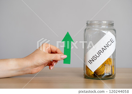 Bank of coins Insurance and green arrow up. Concept of growth of insurance rates and tariff. Business and finance concept Bank of coins Insurance and green arrow up. Concept of growth of insurance rates and tariff. Business and finance concept 120244058