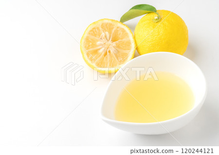 Yuzu and yuzu juice on white background 120244121