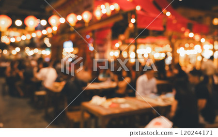 Abstract blur people at night food market background. Vintage effect style 120244171