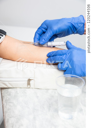 Blood Sample Collection by Medical Professional 120244506