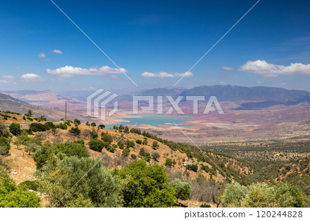 The Bin el Ouidane Dam is an arch dam on the El-Abid River in Azilal Province, Morocco 120244828