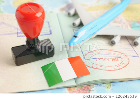 Italy passport with approved stamp on document for tourism to immigration at airport in country. Italy passport with approved stamp on document for tourism to immigration at airport in country. 120245539