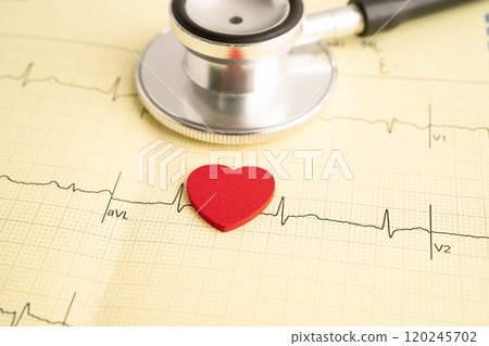 Stethoscope on electrocardiogram ECG, heart wave, heart attack, cardiogram report. 120245702