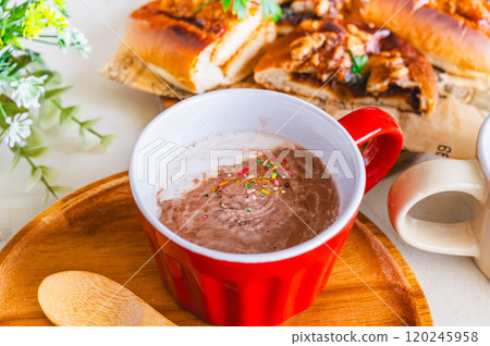 Caffe latte topped with whipped cream 120245958