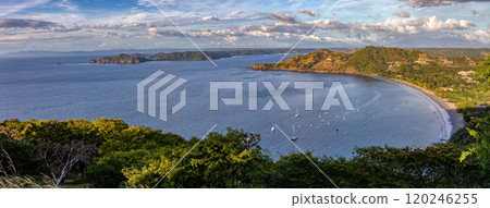 Pacific ocean on rock in Playa Poor Calzon Beach, El Coco Costa Rica 120246255