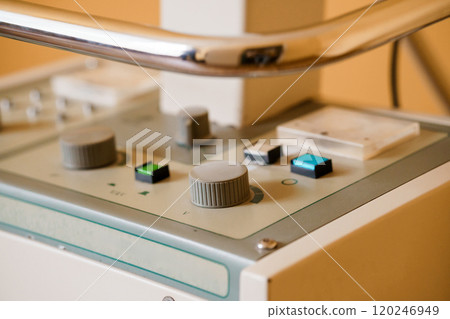 Vintage Medical Equipment Control Panel with Knobs and Buttons Vintage Medical Equipment Control Panel with Knobs and Buttons 120246949