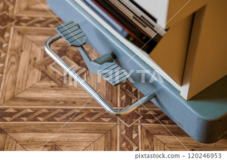 Vintage Furniture Detail with Pedal on Beautifully Patterned Wooden Floor Vintage Furniture Detail with Pedal on Beautifully Patterned Wooden Floor 120246953