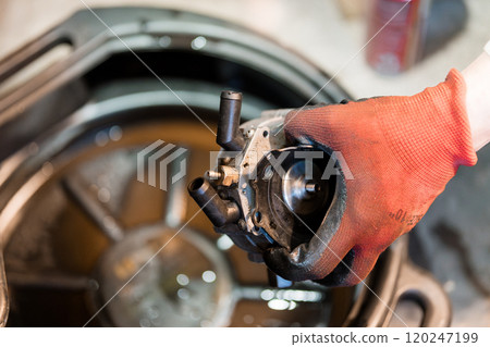 Precision Engine Component Maintenance in an Automotive Workshop Precision Engine Component Maintenance in an Automotive Workshop 120247199