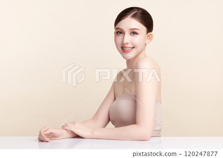 Beautiful young asian woman with clean fresh skin on beige background, Face care, Facial treatment, Cosmetology, beauty and spa, Asian women portrait. 120247877
