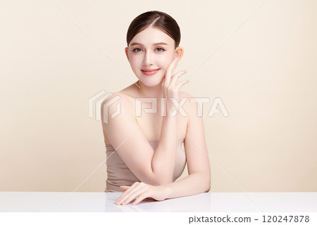 Beautiful young asian woman with clean fresh skin on beige background, Face care, Facial treatment, Cosmetology, beauty and spa, Asian women portrait. 120247878