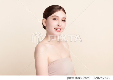 Beautiful young asian woman with clean fresh skin on beige background, Face care, Facial treatment, Cosmetology, beauty and spa, Asian women portrait. 120247879