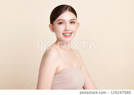 Beautiful young asian woman with clean fresh skin on beige background, Face care, Facial treatment, Cosmetology, beauty and spa, Asian women portrait. Beautiful young asian woman with clean fresh skin on beige background, Face care, Facial treatment, Cosmetology, beauty and spa, Asian women portrait. 120247880