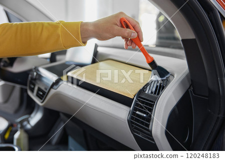 Cropped shot of male master cleaning side sills 120248183