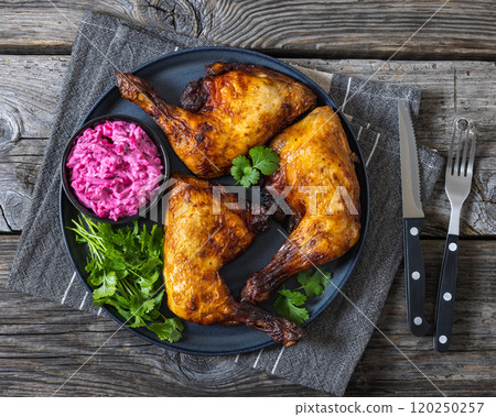 roast chicken leg quarters with a beetroot salad 120250257