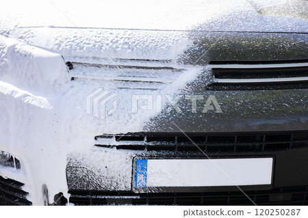 Car Maintenance Foam Washing in Action for a Professional Clean and Polished Look 120250287