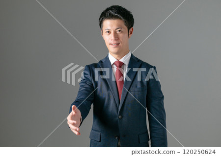 A businessman to reach out A businessman to reach out 120250624
