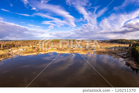 Aerial top view to island overgrown with sparse trees in summer sunny day. Skerries Ladoga lake consisting of 650 rocky islands and steep cliffs. National park, Karelia, Russian nature. 120251370