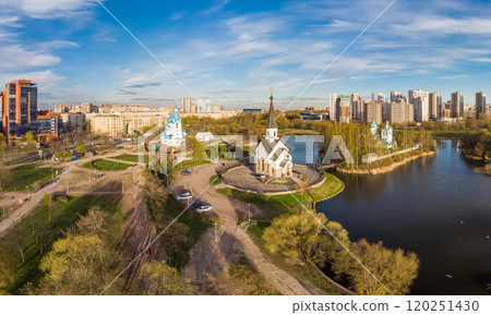 Aerial top View to St. George the Victorious Georgievskaya, Sergius Of Radonezh and Church Nativity of Christ and Srednerogatsky pond. Pulkovsky park. Saint Petersburg. Russia. Europe Aerial top View to St. George the Victorious Georgievskaya, Sergius Of Radonezh and Church Nativity of Christ and Srednerogatsky pond. Pulkovsky park. Saint Petersburg. Russia. Europe 120251430