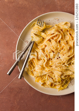 Fettuccine, tagliatelle, in creamy garlic sauce, Italian traditional cuisine, pasta carbonaro, Fettuccine, tagliatelle, in creamy garlic sauce, Italian traditional cuisine, pasta carbonaro, 120251860
