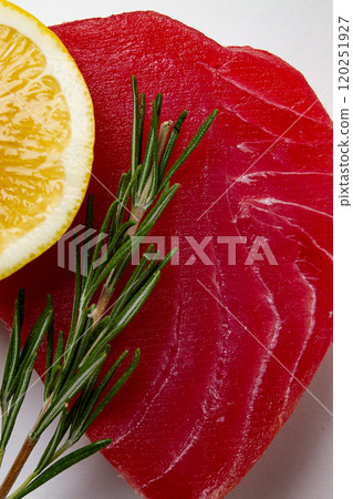 fresh red tuna fillet, for steak, raw, top view, on a cutting board, no people, fresh red tuna fillet, for steak, raw, top view, on a cutting board, no people, 120251927