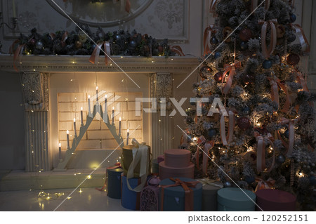 New Year's interior with a decorated Christmas tree fireplace. Christmas house 120252151