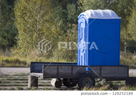 Mobile toilet. Temporary cabin toilet on a trailer in the woods Mobile toilet. Temporary cabin toilet on a trailer in the woods 120252189
