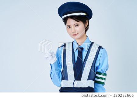 A woman in a security guard or police uniform 120252666