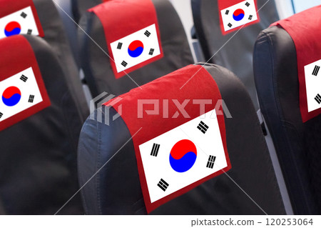 Korean Flag on Empty seat in plane. Travel, flight and transportration in Korea concept Korean Flag on Empty seat in plane. Travel, flight and transportration in Korea concept 120253064