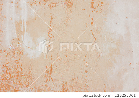 Textured orange plaster wall surface with peeling paint. Aged, weathered concrete background Textured orange plaster wall surface with peeling paint. Aged, weathered concrete background 120253301