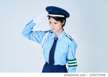 A woman in a security guard uniform saluting 120253346