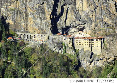 Image of the monastery built into the rocks on the mountainside. 120253468