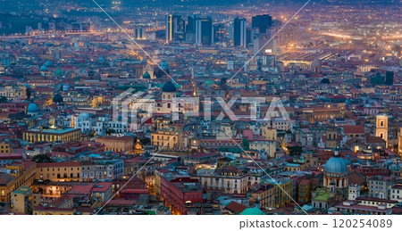 Aerial night view of glowing streets of Naples, Italy. Naples has one of biggest historical city centres in world. Aerial night view of glowing streets of Naples, Italy. Naples has one of biggest historical city centres in world. 120254089
