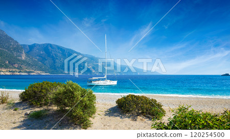 Oludeniz beach with blue sea on Mediterranean coast of Turkey Oludeniz beach with blue sea on Mediterranean coast of Turkey 120254500