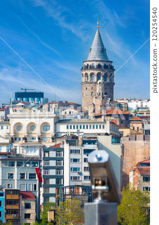 Galata Tower stands tall amidst urban skyline of Istanbul, Turkey 120254540