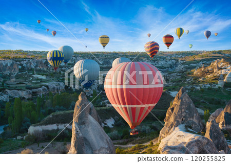 Hot air balloons at sunrise in Cappadocia, Turkey Hot air balloons at sunrise in Cappadocia, Turkey 120255825