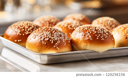 Freshly baked sesame buns. 120256156