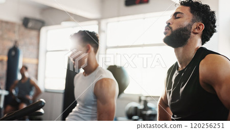 Exercise bike, fitness and tired with men in gym together for break from cardio training or workout. Breathing, elliptical machine and sweating with sporty friends in health club for workout together Exercise bike, fitness and tired with men in gym together for break from cardio training or workout. Breathing, elliptical machine and sweating with sporty friends in health club for workout together 120256251