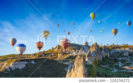 Hot air balloons at sunrise in Cappadocia, Turkey Hot air balloons at sunrise in Cappadocia, Turkey 120256272